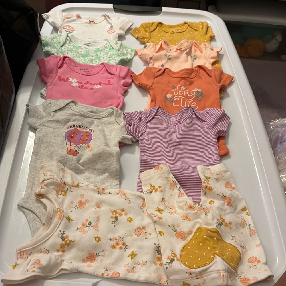 New unworn newborn onesies assortment